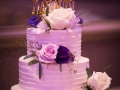 White cake, purple flowers