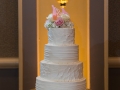 White Cake with Pink Penguin Cake Topper