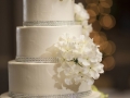 White cake with Floral Accent and Silver Band